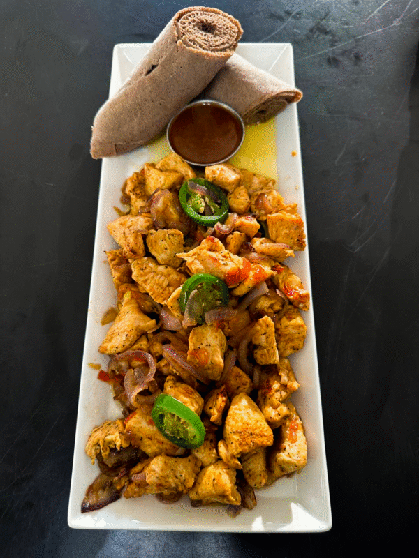 Tibs with vegetables and injera